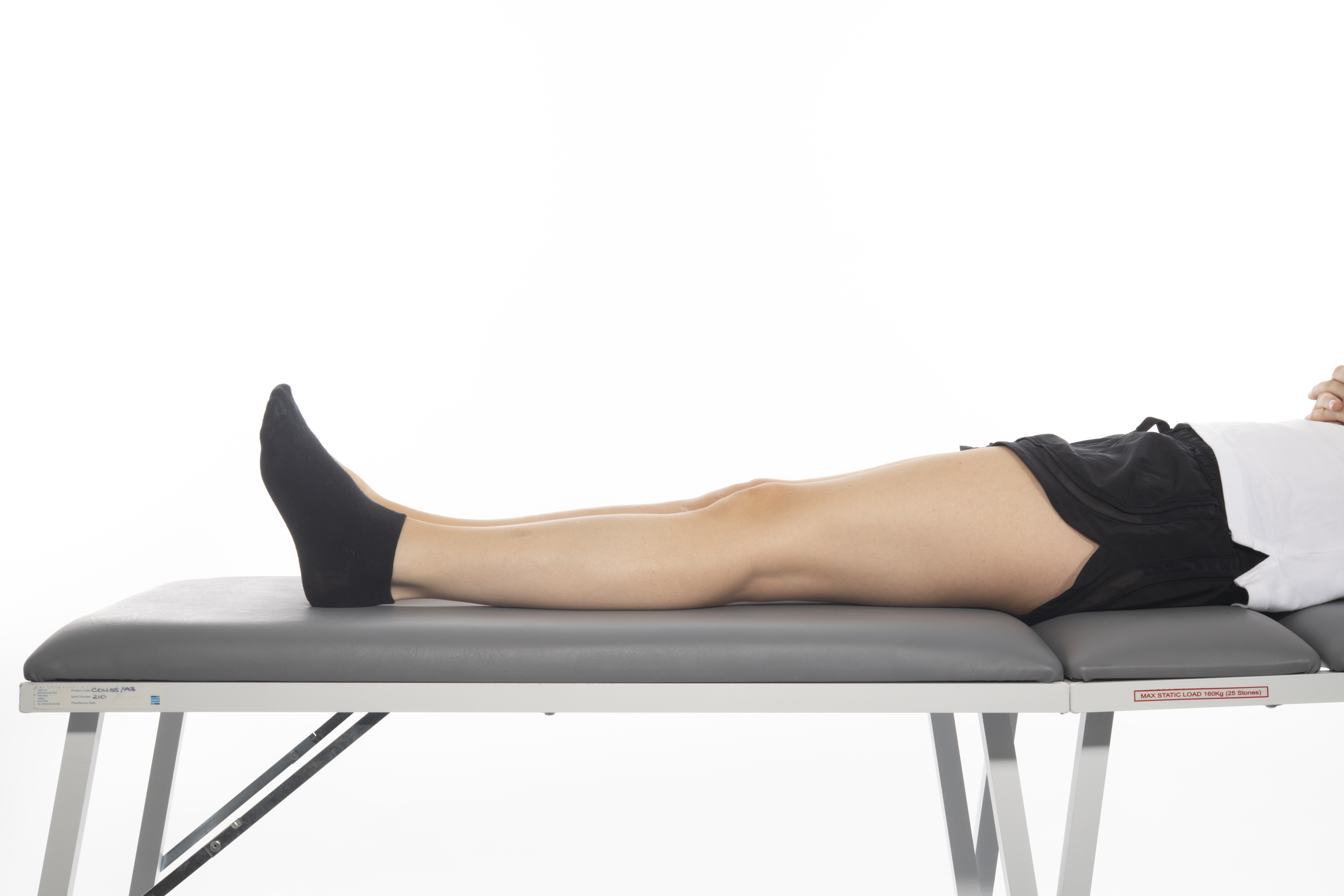 Lying hip flexion exercise; lie on bed