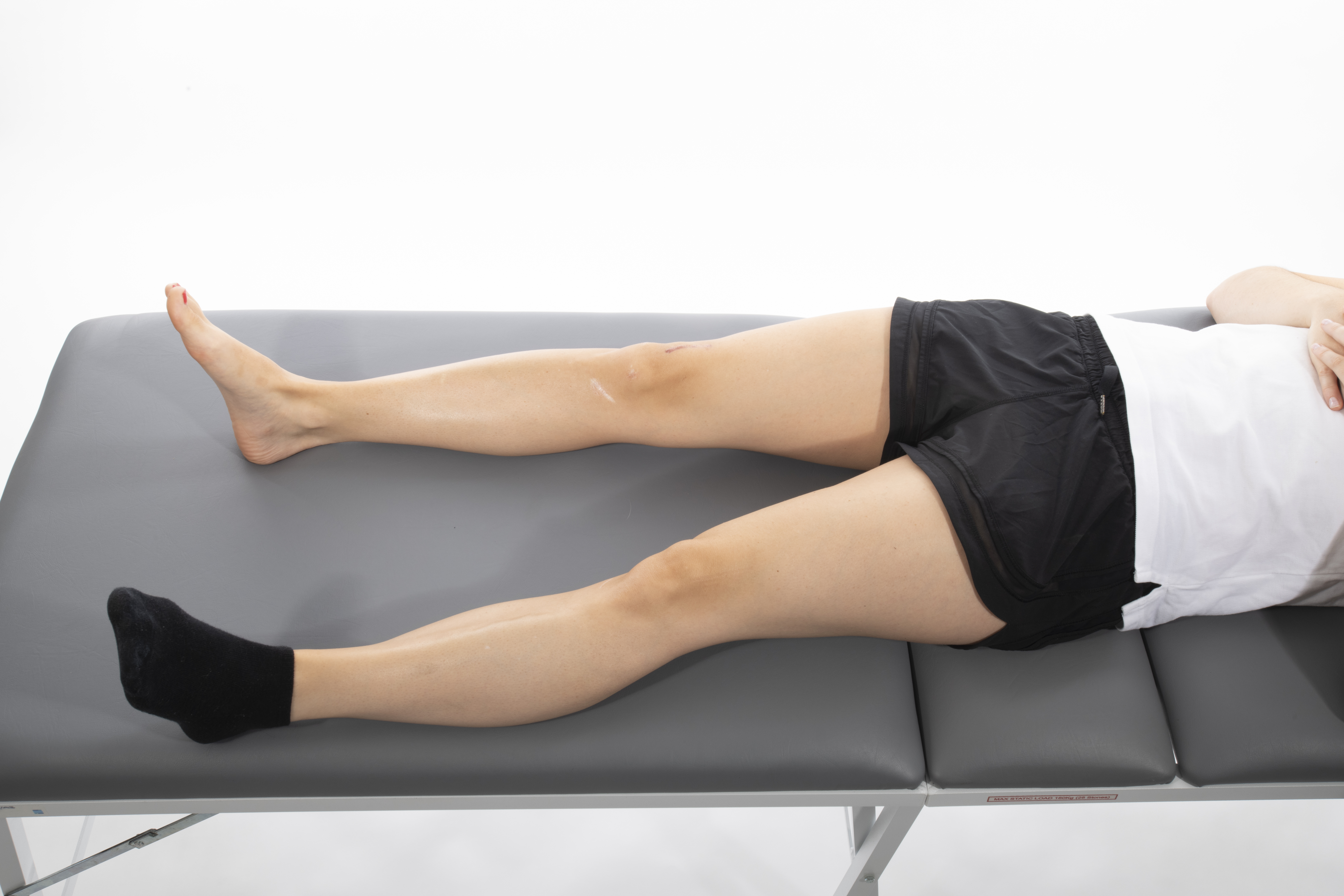 Lying hip abduction exercise; move your operated leg out to the side, keeping your knee straight and toes pointed to the ceiling