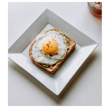 Photo of fried / poached egg on toast