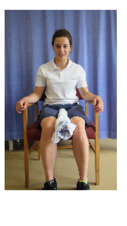 Place a rolled up towel between your knees. Squeeze the towel with your thighs