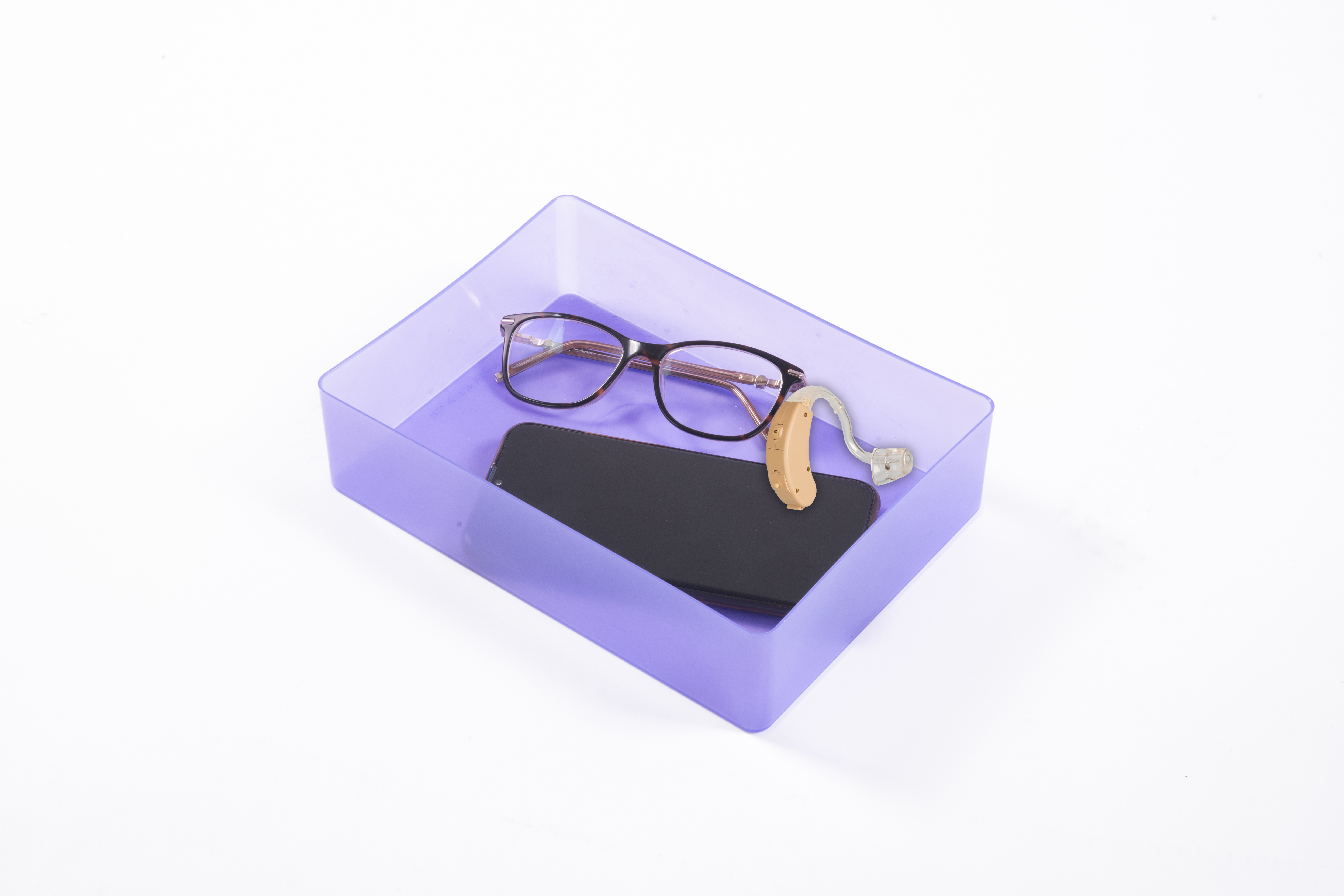 Sensory box holding glasses, hearing aid, and mobile phone