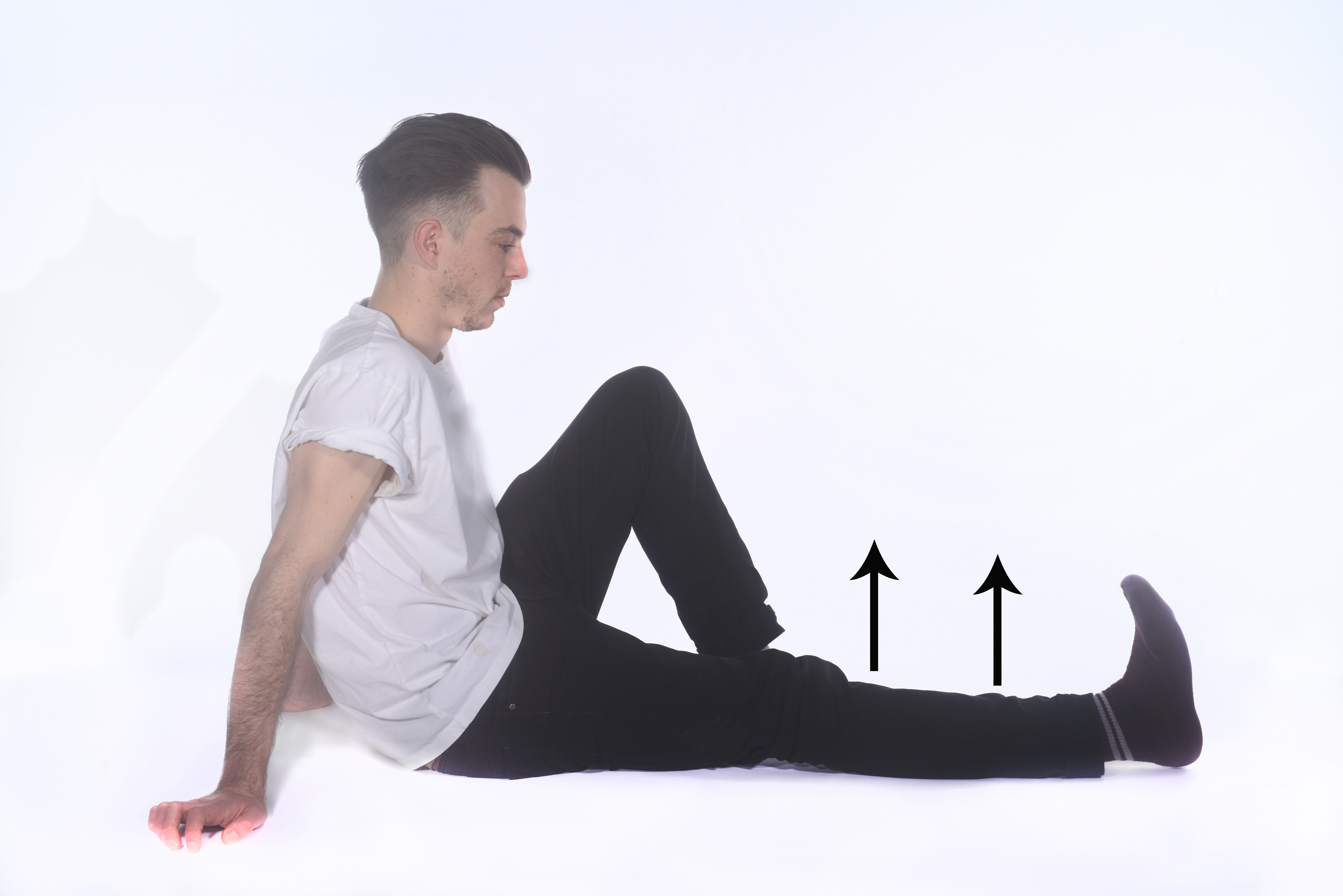 Sitting on the floor, with legs out in front. Lifting your leg straight off the floor without bending your knee.